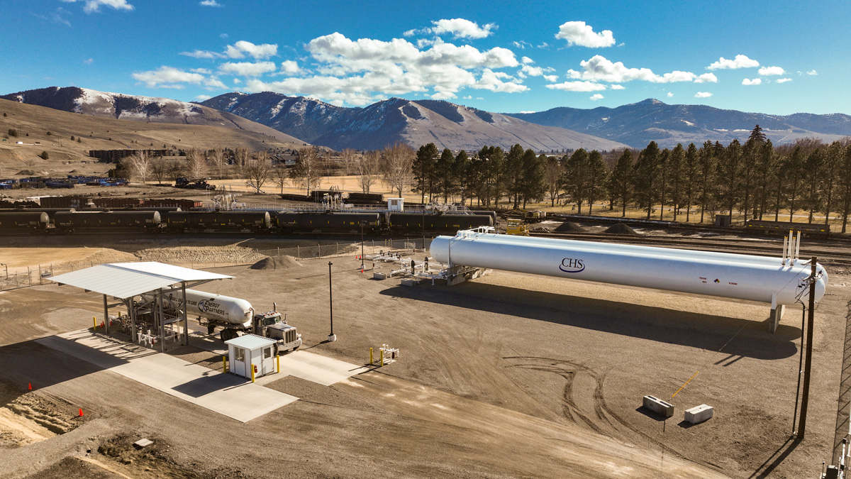 Loading a propane storage tank on a flat-bed truck